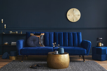 Elegant modern living room interior design with glamour blue velvet sofa, pouf, black metal shelf,...