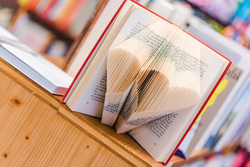 a book where the inside pages of the book are folded in the shape of a heart