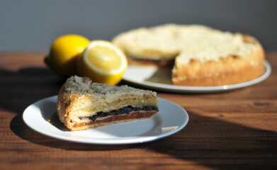 Piece of fruit pie on a wooden table