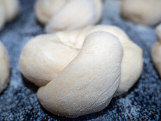 Fototapeta na wymiar the process of making buns. Raw dough.