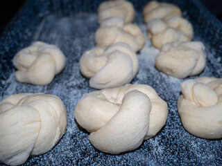 the process of making buns. Raw dough.