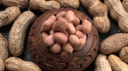 Composition of peanuts serving to make oil, peanut butter. Great for healthy and dietary nutrition. Concept of: condiments, dried fruit, food.