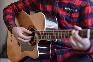 Fototapeta premium person playing guitar