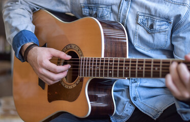 man playing guitar