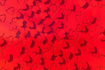 Background of red hearts on metal