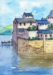 Watercolor illustration of a small town above the sea with blue roofed houses, trees growing behind a hedge and a wooden jetty near a stone wall