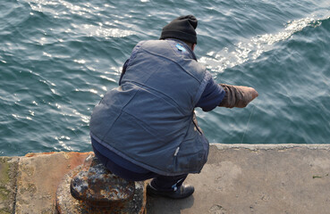 Fischen ohne Angel in Qingdao, China