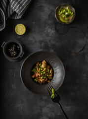 soba with mushrooms on a dark background