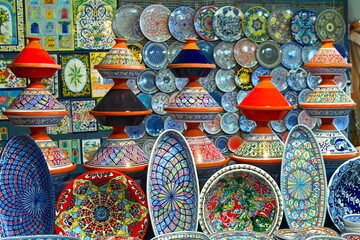 Traditional moroccan pottery and kitchenware on display for tourists
