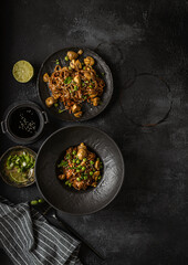 soba with mushrooms on a dark background