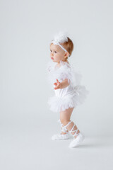 little baby ballerina on a white background