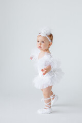 little baby ballerina on a white background