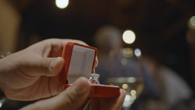 Man proposing marriage to his girlfriend