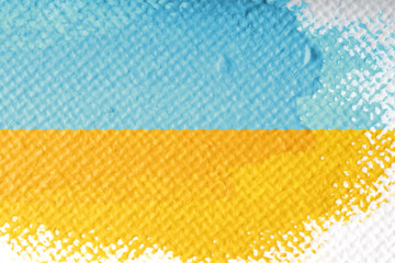 yellow and blue canvas, painted in colors of Ukraine flag