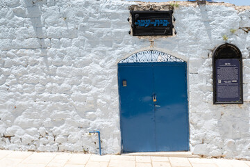 Tsfat, Israel - June 10, 2021: Old blue door in Safed (Tsfat) in Israel
