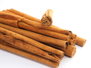 Cinnamon  (Cinnamomum verum) sticks. . Close-up. Spice isolated on white background © Nick Alias