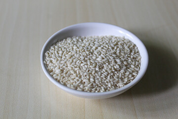 White sesame seed on the small bowl