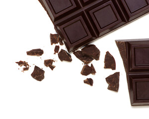 Broken chocolate bar isolated on white