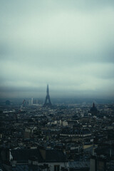 City view and Paris SKyline Eiffel Tower with foggy sky
