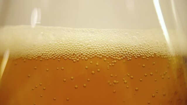 Drinking alcohol danger, beer with ambulance police lights flashing, drink drive