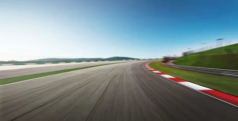 Selbstklebende Fototapeten Curvy motion blurred race track. © Image Craft