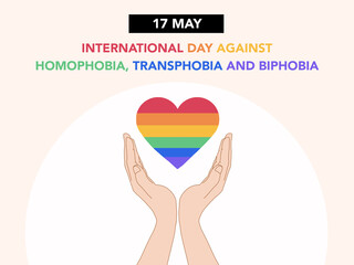 LGBT heart between 2 hands, rainbow heart for international day against homophobia, transphobia and biphobia