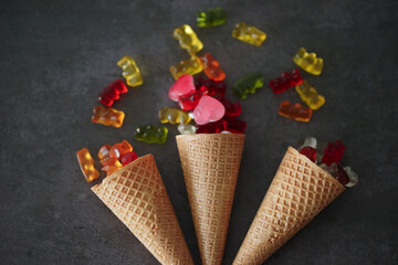 Waffle cone filled with colored jellies