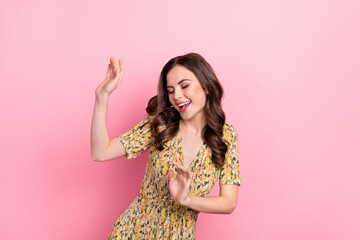 Photo of impressed young brunette lady dance wear yellow dress isolated on pink color background