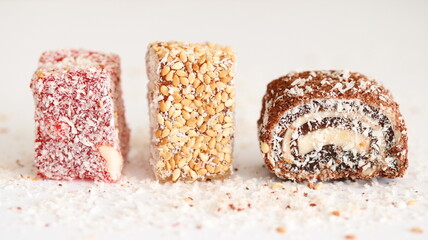 Turkish delight. Rahat lokum isolated on white background, on table.