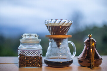 Set of drip coffee on table and blurred background.
