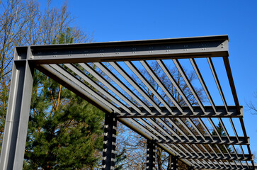 metal construction of the bus stop, gazebo pergola shelter. The roof is designed for climbing...