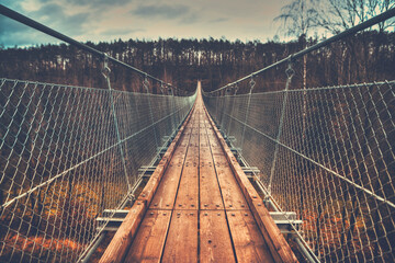 Suspension rope bridge in Hohe Schrecke, Germany.