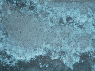 Cement or concrete wall texture. Destroyed surface. Grunge background in grey and blue tones. 
