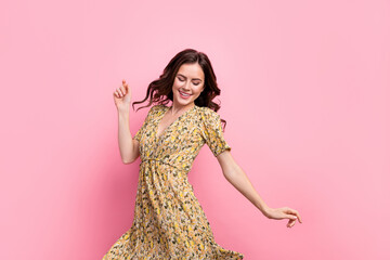 Photo of lovely positive girl enjoy dancing free time weekend isolated on pink color background