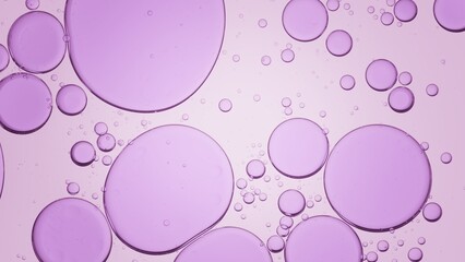 Big purple clear oil bubbles in transparent fluid on light violet background | Background for skincare gel commercial