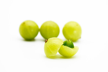 gooseberry fruits or Amalaki slice isolated on white background.selective focus