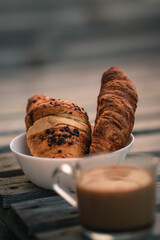 cup of coffee with croissant 