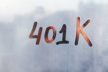 Hand drawn numbers 401 on foggy glass on suset window
