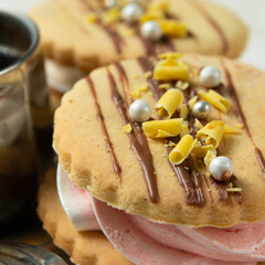 cookies with marshmallows, sweet sandwich close-up, dessert covered with chocolate, sweet decoration for coffee or tea
