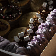 sweet gift set of marshmallows and cookies, box with sweets. contrast close-up of dessert.
