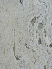 Beige stone surface of light colour on the street walkaway outside in Madrid, Spain
