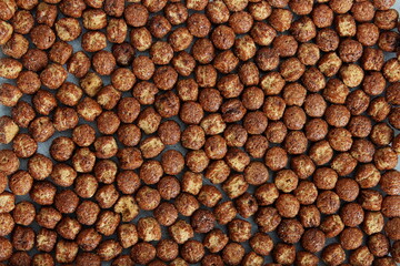 healthy breakfast chocolate cereal balls isolated,top view