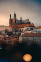 Poster Vertical shot of old european houses and gothic prague castle, Czech republic © Mr_rafy/Wirestock Creators