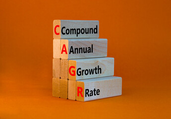 CAGR compound annual growth rate symbol. Concept words CAGR compound annual growth rate on wooden...