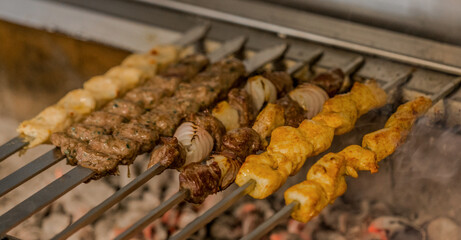 Arabic traditional food kufta and lamb brochette on the grill