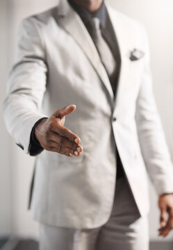 Let me lead you towards business excellence. Closeup shot of an unrecognizable businessman extending a handshake.