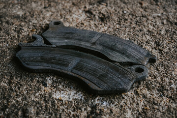 Motorcycle disc brake pads that are out of use.