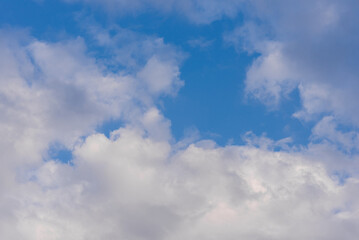 White clouds are soft and fluffy floating on blue sky for backgrounds concept, Selective focus.