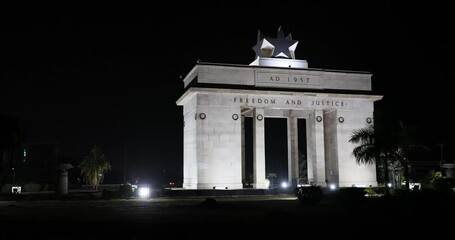 Black Star Square Independence monument night Accra Ghana pan. Historical central urban area downtown. Civic and military parades in Ghana. Celebrate the nation's independence from the British.