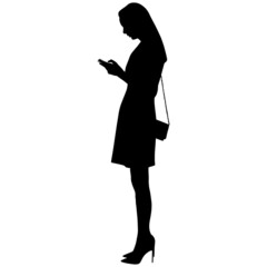 Black silhouette of slender woman in short dress with purse in high-heeled shoes in phone in her hand